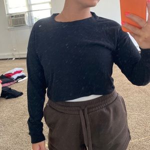 Cropped long sleeve black top